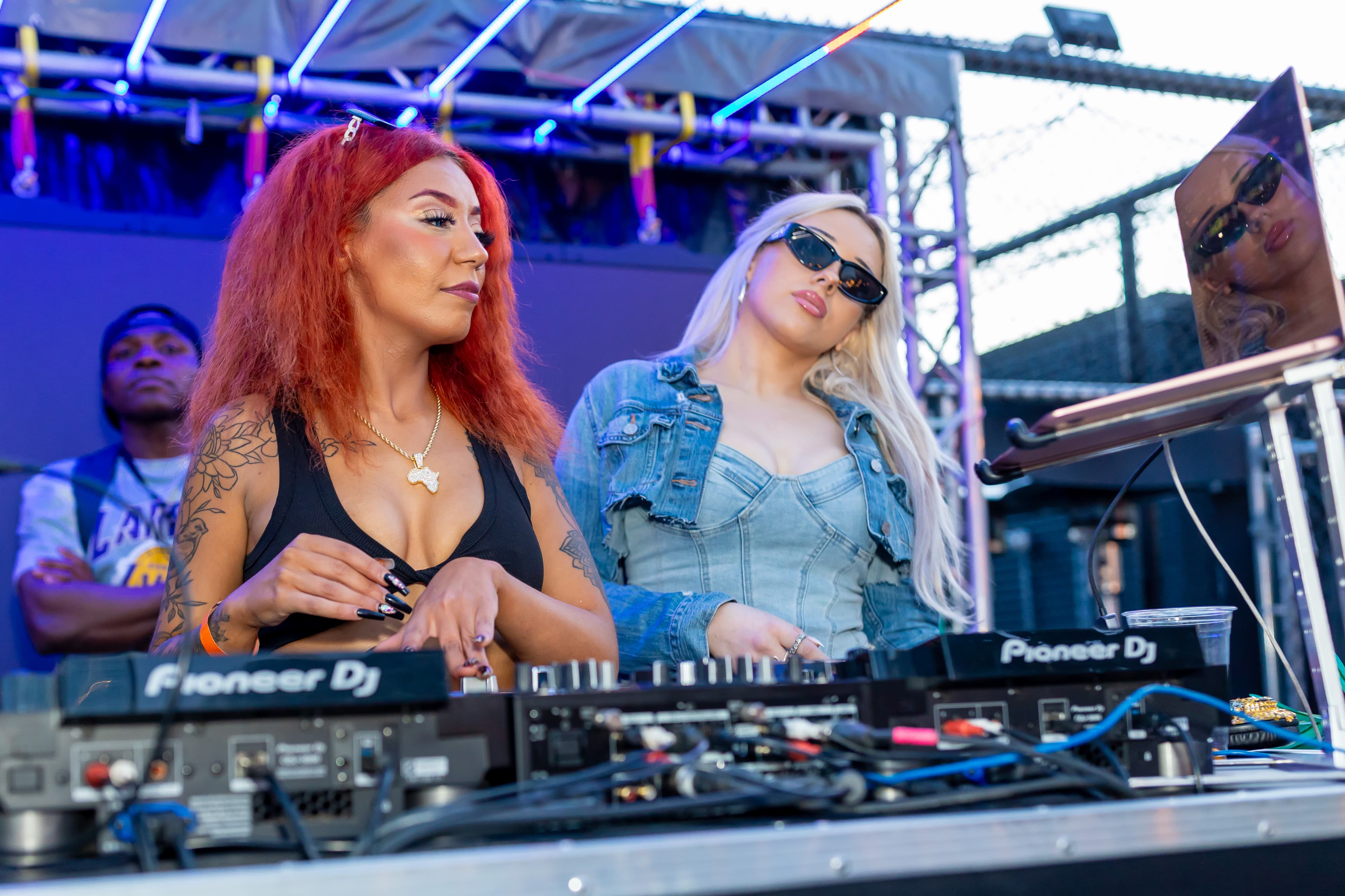 DJs performing at a live event